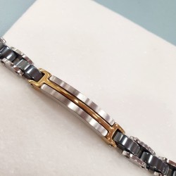 Βραχιόλι Χειροπέδα ανδρική από ατσάλι L316 σε ασημένιο χρώμα με λεπτομέρειες μαύρες και πινελιές χρυσό 