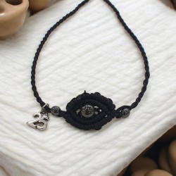 Diaxeirinis Βραχιόλι γούρι μάτι με αιματίτη σε χρώμα μαύρο με πλέξη μακραμέ και γουράκι "25"