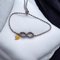 Diaxeirinis Βραχιόλι γούρι άπειρο σε χρώμα γκρι με πλέξη μακραμέ και γουράκι "25"