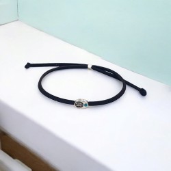 Diaxeirinis Βραχιόλι γούρι 2025  με ματάκι και δέρμα σε μαύρο χρώμα και αυξομείωση στο κούμπωμα 