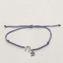 Diaxeirinis Βραχιόλι γούρι 25 με στοιχείο πέταλο ασημένιο  925 με γκρι κορδόνι με ιδιαίτερο δέσιμο 