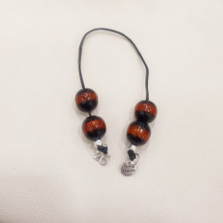 Μπεγλέρι γούρι 2026 με χάντρα δίχρωμη ταμπά μαύρη 