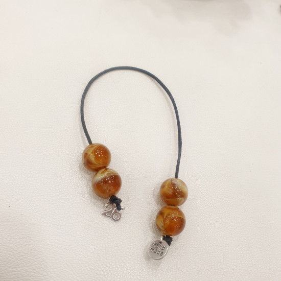 Μπεγλέρι γούρι 2026 με χάντρα ταμπά