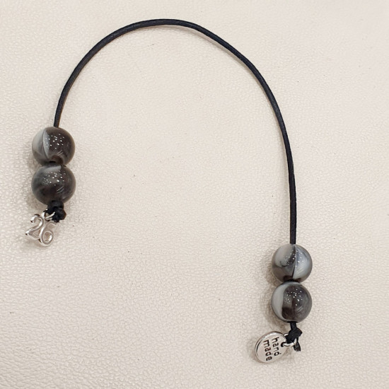 Μπεγλέρι γούρι 2026 με χάντρα γκρι