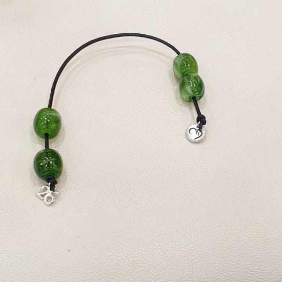 Μπεγλέρι γούρι 2026 με χάντρα πράσινη