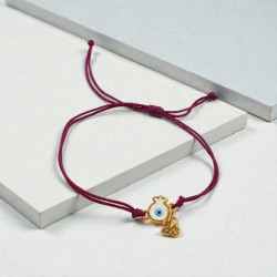 Βραχιόλι γούρι 2026 ρόδι  μάτι σε χρώμα χρυσό με ματζέντα κορδόνι με αυξομείωση στο κούμπωμα 