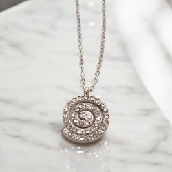 Κολιέ σπείρα με ζιργκόν με ατσάλινη αλυσίδα L316 με προέκταση  στο κούμπωμα σε ασημένιο χρώμα 