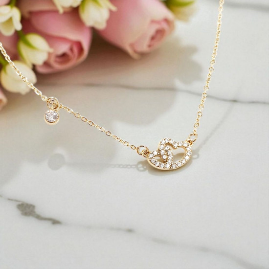 Κολιέ διπλής καρδιάς από λευκό ζιργκόν με ατσάλινη αλυσίδα σε χρυσό χρώμα 