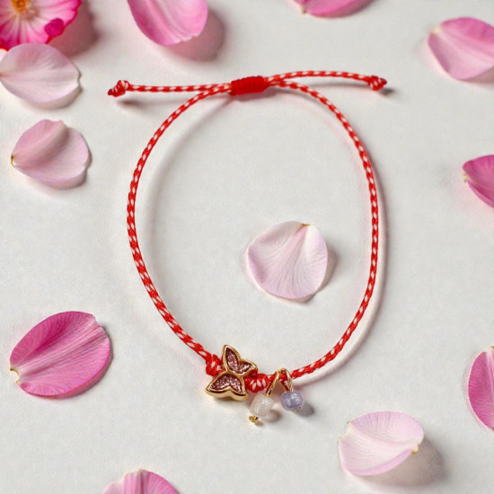 Βραχιόλι Μάρτης  πεταλούδα ροζ με λεπτομέρειες τυρκουαζ και άσπρες πετρούλες και αυξομείωση στο κούμπωμα 