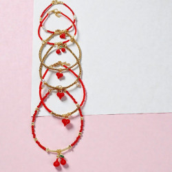 Βραχιόλι με καρδούλα  με κόκκινες πετρούλες και χρυσό αιματίτη