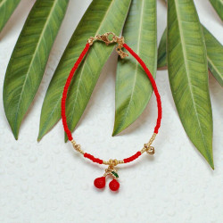 Βραχιόλι με κερασάκι με κόκκινες πετρούλες και χρυσό αιματίτη