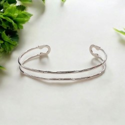 Βραχιόλι Χειροπέδα  σε ασημένιο χρώμα από ατσάλι 316L 