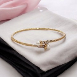 Βραχιόλι Χειροπέδα σε χρυσό χρώμα από ατσάλι 316L  με πέρλα