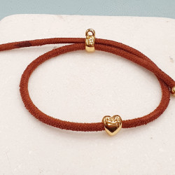 Βραχιόλι καρδιά ball δύο όψεων σε χρυσό χρώμα με κορδόνι σε χρώμα ταμπά με αυξομείωση στο κούμπωμα 